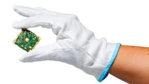 Hand with small PCB | NCAB Group