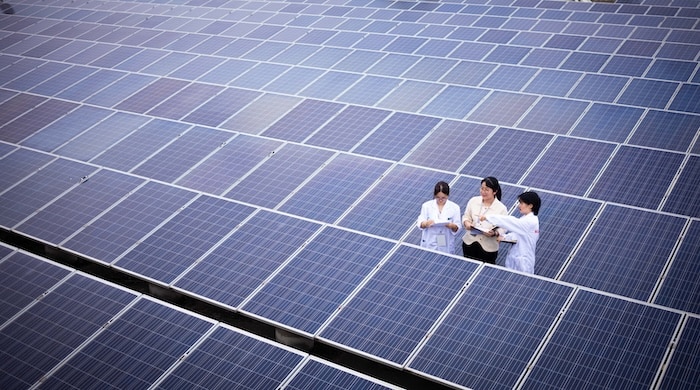 Solar panels and NCAB employees in one of our partner factories | NCAB Group